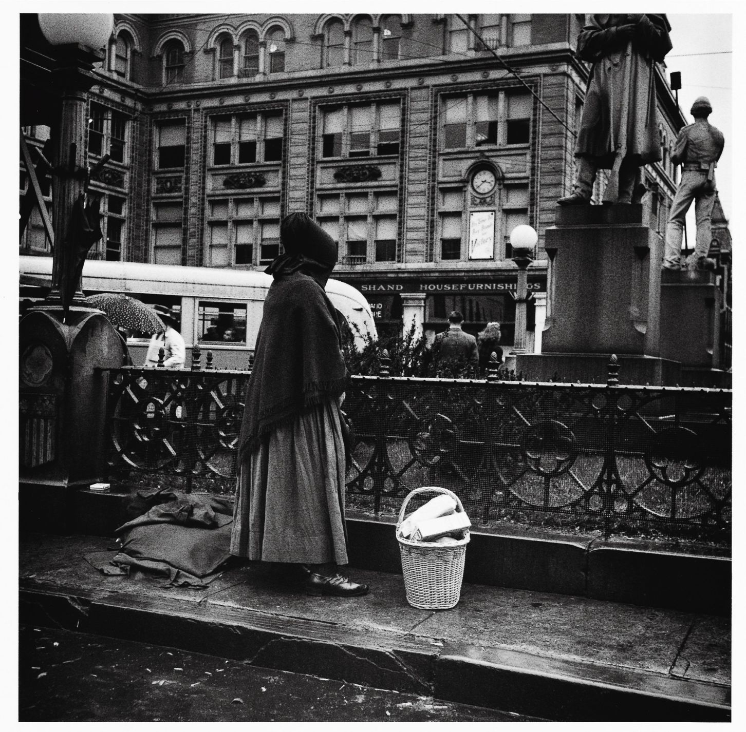 Woman waiting for a bus, 1942